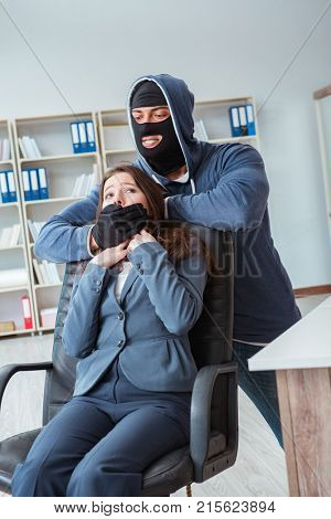 Criminal taking businesswoman as hostage in office