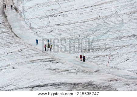 People Hiking On Dachstein Glacier Near Hunerkogel Station, Austrian Alps