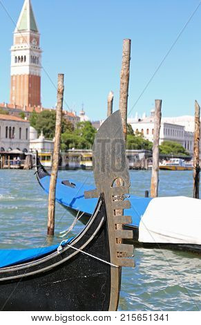 Bow Of The Gondola And In The Background The Bell Tower Of San M