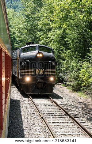 ELKINS, WEST VIRGINIA - JUNE 19, 2016: Tygart Flyer on steep trip into mountains of West Virginia by Durbin and Greenbrier Vallery Railroad