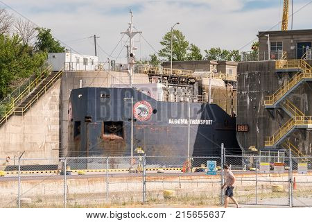 NIAGARA FALLS, CANADA - JUNE 30, 2016: Large metal gates of industrial shipping locks on Welland Canal climbing Niagara Escarpment