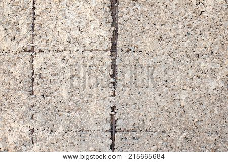 Grey old wall with rebar. Old grey worn wall with rebar.