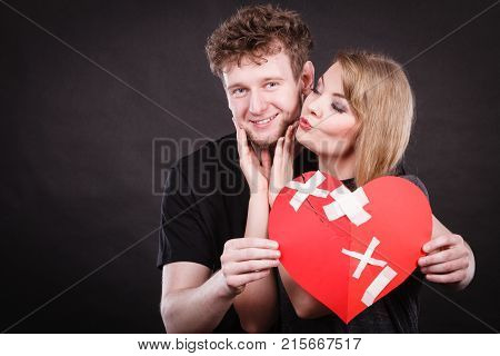 Couple Holds Broken Heart Joined In One