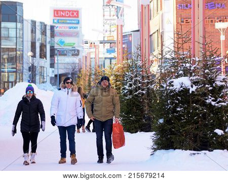 People Passing By Lordi Square In Winter Rovaniemi