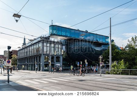 Graz, Austria - August 11, 2017: Kunsthaus Graz is a musem of Art. Low angle view a cloudy day