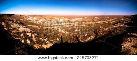 Panorama view to Aral sea from the rim of Plateau Ustyurt at sunset in Karakalpakstan Uzbekistan