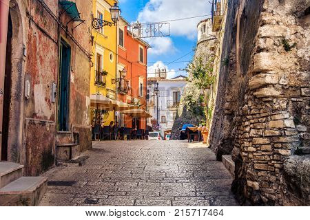 colorful south italy village alley in Apulia in the town of Vico del Gargano Italy 14 Jul 2017