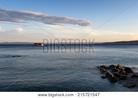 A Small Cruise Ship On The Adriatic Sea In The Evening Near Bask