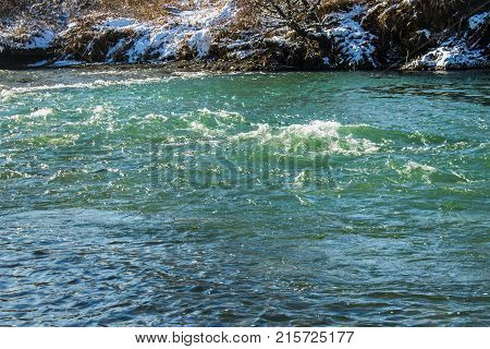 River In Winter. Rapids Of Stormy River. Winter Landscape.