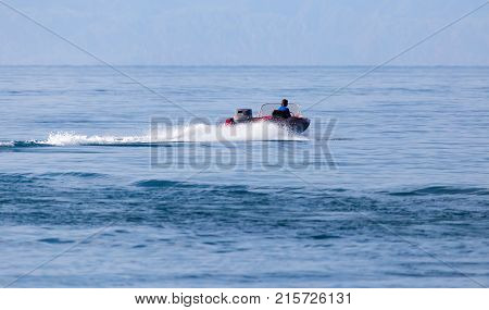 motor boat on the water at a speed of .