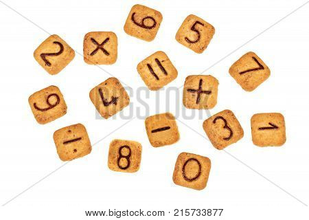 Square Cookies Square Cookies With Chocolate Numbers And Mathematical Signs On Them Lay Scattered Ab