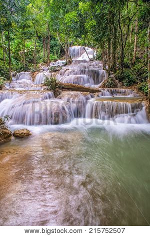 Mae Kae waterfall the Most Famous in Lampang Thailand. Beautiful silky waterfall flow through stones. Mountain stream running over rocks.