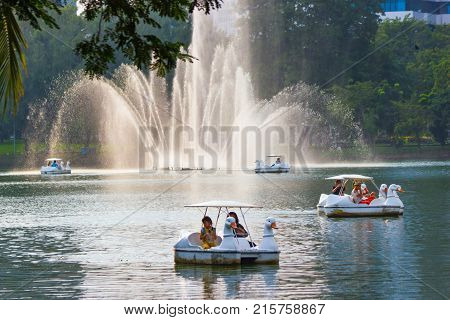Bangkok Thailand: November 18, 2017:- Central Park, Bangkok Thailand, holiday People relax on a boat in a city park in Lumpini Park