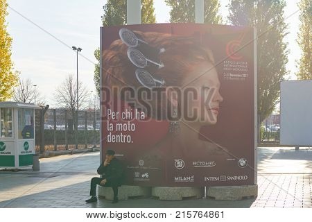 MILAN, ITALY - NOVEMBER 11, 2017: advertisement at the EICMA 2017. EICMA is an annual trade show in Milan, Italy featuring motorcycles.