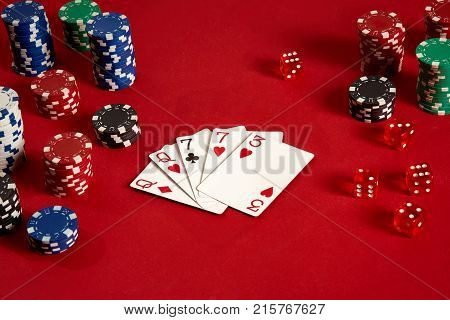 Poker cards and gambling chips on red background. Top view. Copy space. Still life. Flat lay. 2 Pair