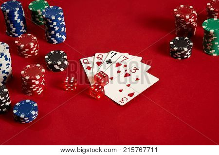 Poker cards and gambling chips on red background. Top view. Copy space. Still life. Flat lay. 2 Pair
