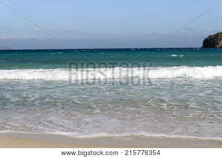 Beautiful White Clouds On Blue Sky Over Calm Sea With Sunlight Reflection, Bali Indonesia. Tranquil