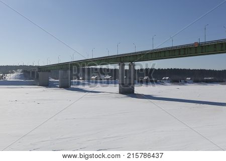 Road bridge over the river in the city Sukhona Totma, Vologda region, Russia