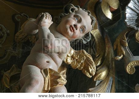 BELEC, CROATIA - NOVEMBER 17: Angel statue on the altar in the Baroque Church of Our Lady of the Snow in Belec, Croatia on November 17, 2011.