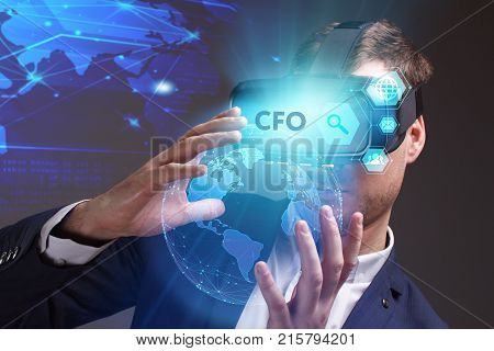 Business, Technology, Internet And Network Concept. Young Businessman Working In Virtual Reality Gla