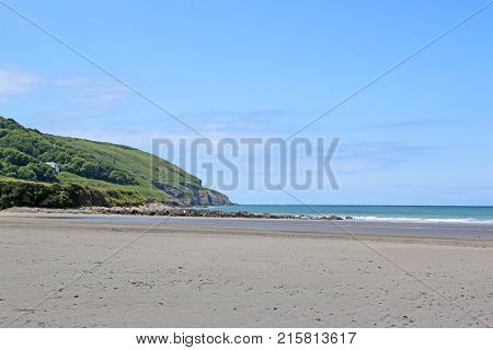 Beach and cliffs of Poppit Sands in Wales