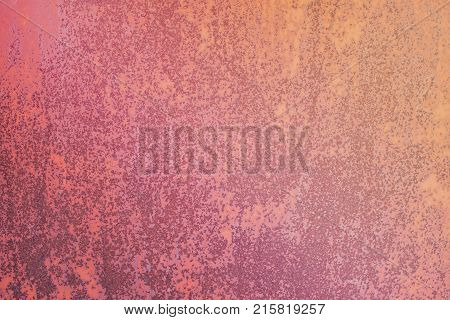 Pink paint cracked metal background. Vintage iron texture
