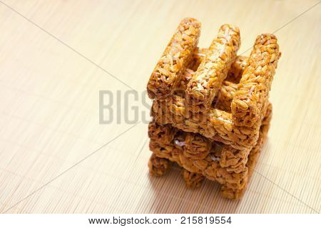 Sunflower seed brittle gosinach kozinaki . Tasty sweets background. Nutritious and delicious healthy snacks. Pressed sunflower seeds candied in sweet syrup.