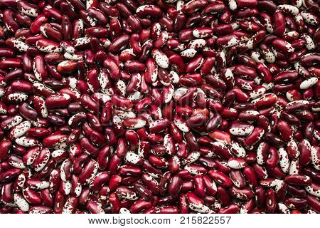 Health Benefits of Beans. Red and white beans background. Benefits for diet weight control and diabetes.