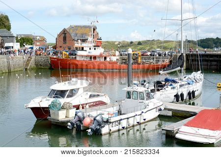 PADSTOW, UK - SEPTEMBER, 2 2017: People of their holidays and enjoying the fishing port and town of Padstow, Cornwall, UK