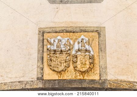 VARAZDIN, CROATIA - FEBRUARY 07, 2015 Coat of arms on the castle wall above the entrance door in Old Town in winter time.