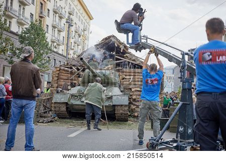 MOSCOW, RUSSIA - SEP 10, 2017: Shooting a movie episode with legendary T-34 tank on Tverskaya Street during celebration 870th anniversary of Moscow.