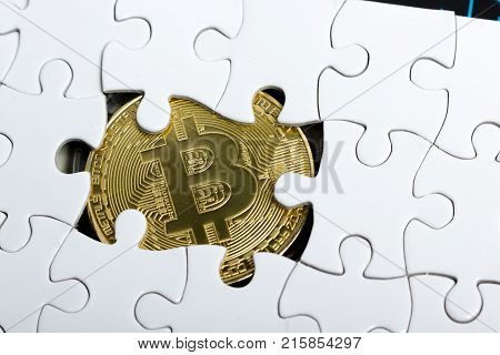 golden bitcoin coin. cryptocurrency. Missing jigsaw puzzle pieces. Business concept. Compliting final task