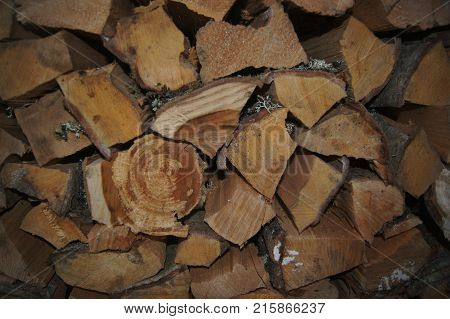 Colored wooden logs stacked in the stack.