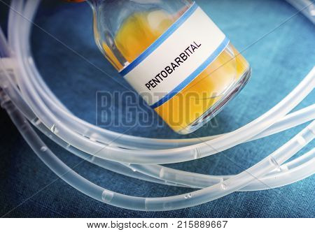 Vial with pentobarbital used for euthanasia and lethal inyecion in a hospital, conceptual image