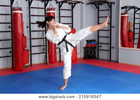 Female karate instructor in dojo