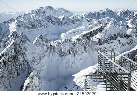 Beautiful snowy peaks in winter. View from peak Lomnicky stit in High Tatras mountains Slovakia