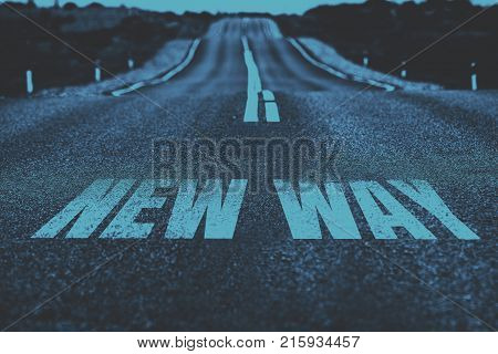 An image of a road to the horizon with text new way Toned