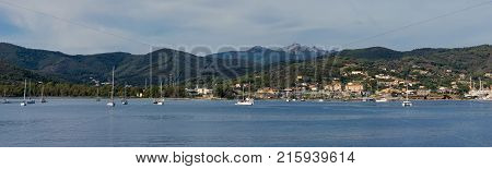 Few Boats And Ships In Elba Bay Near Italy Tuscany Coastline
