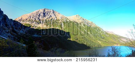 Mountain lake Morskie Oko in Tatra National Park, Poland. Picturesque lake in the mountains landscape in summer. Travel Europe. Beauty world.