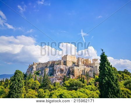 Acropolis of Athens. Parthenon construction in Acropolis Hill in Athens Greece. Beautiful landscape with green trees around ancient architecture.