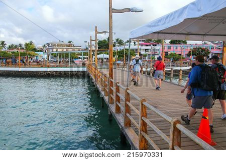 Santa Cruz, Ecuador - April 23: Unidentified People Walk On The Pier At Puerto Ayora On Santa Cruz I