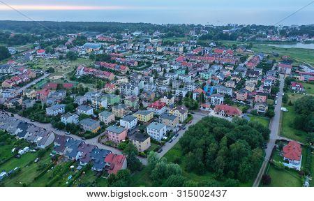 Drone Aerial Perspective View On Colorful Housing Estate In Touristic Mielno City At Baltic Sea