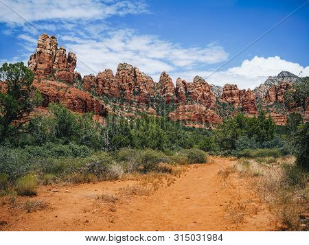 View Of A Range Of Red Rocks Of Sedona, Arizona Including Snoopy Rock From Margs Draw Hiking Trail.