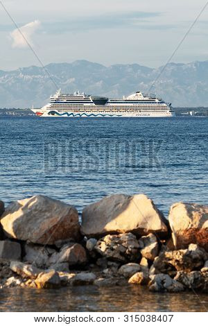 Ugljan, Croatia - July 12, 2019: Aidablu Cruise Ship Departing Zadar Seen From Ugljan Island In Croa