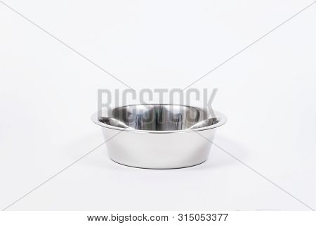Empty Pet Cup Isolated On White Background. Metal Food And Water Bowl For Cat Or Dog. Proper Feeding
