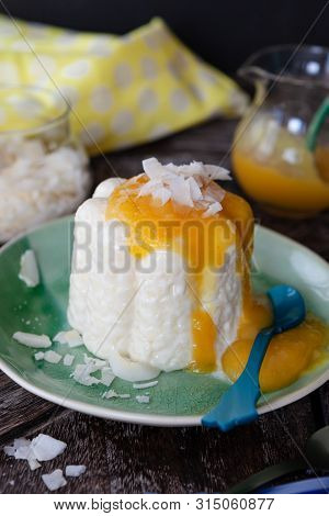Exotic Vegan Rice Pudding With Coconut And Mango Sauce