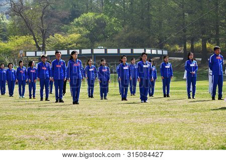 Pyongyang, North Korea - May 1, 2019: Workers  Of Local Factories Gather To Celebrate May 1st Labor 
