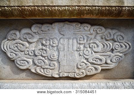Kaesong, North Korea - May 5, 2019: Granite Bas-relief Depict A Holy Pig On The Wall Of Tomb Of King