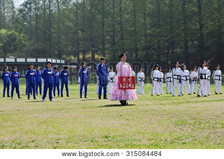 Pyongyang, North Korea - May 1, 2019: Workers  Of Local Factories Gather To Celebrate May 1st Labor 