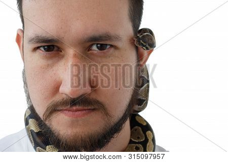 A Man With A Snake Around His Neck. White Background. Snake On The Neck Of A Man. Close-up.